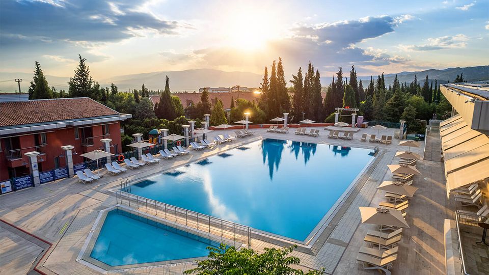 Outdoor thermal pools and sun terraces at the Colossae Thermal & Spa Hotel near Pamukkale.